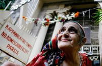 An Indian Parsi woman comes out of a Fire Temple after offering prayers on the occaision of Navroz, or Parsi New Year An Indian Parsi woman comes out of a Fire Temple after offering prayers on the occaision of Navroz, or Parsi New Year